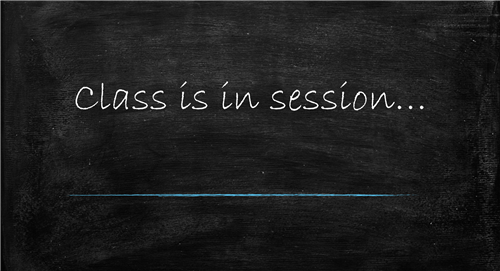 Chalkboard with the words class is in session
